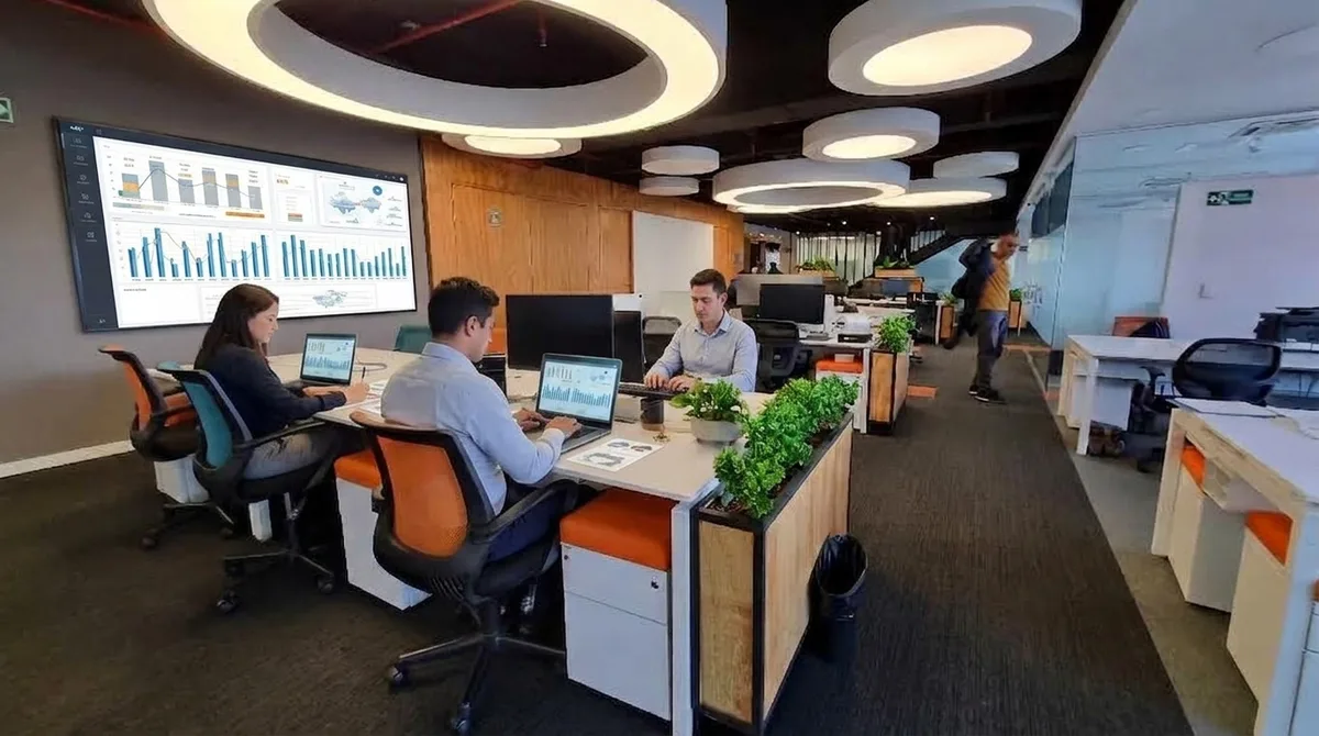 A GCR work floor, with a dashboard of study results on the wall screen